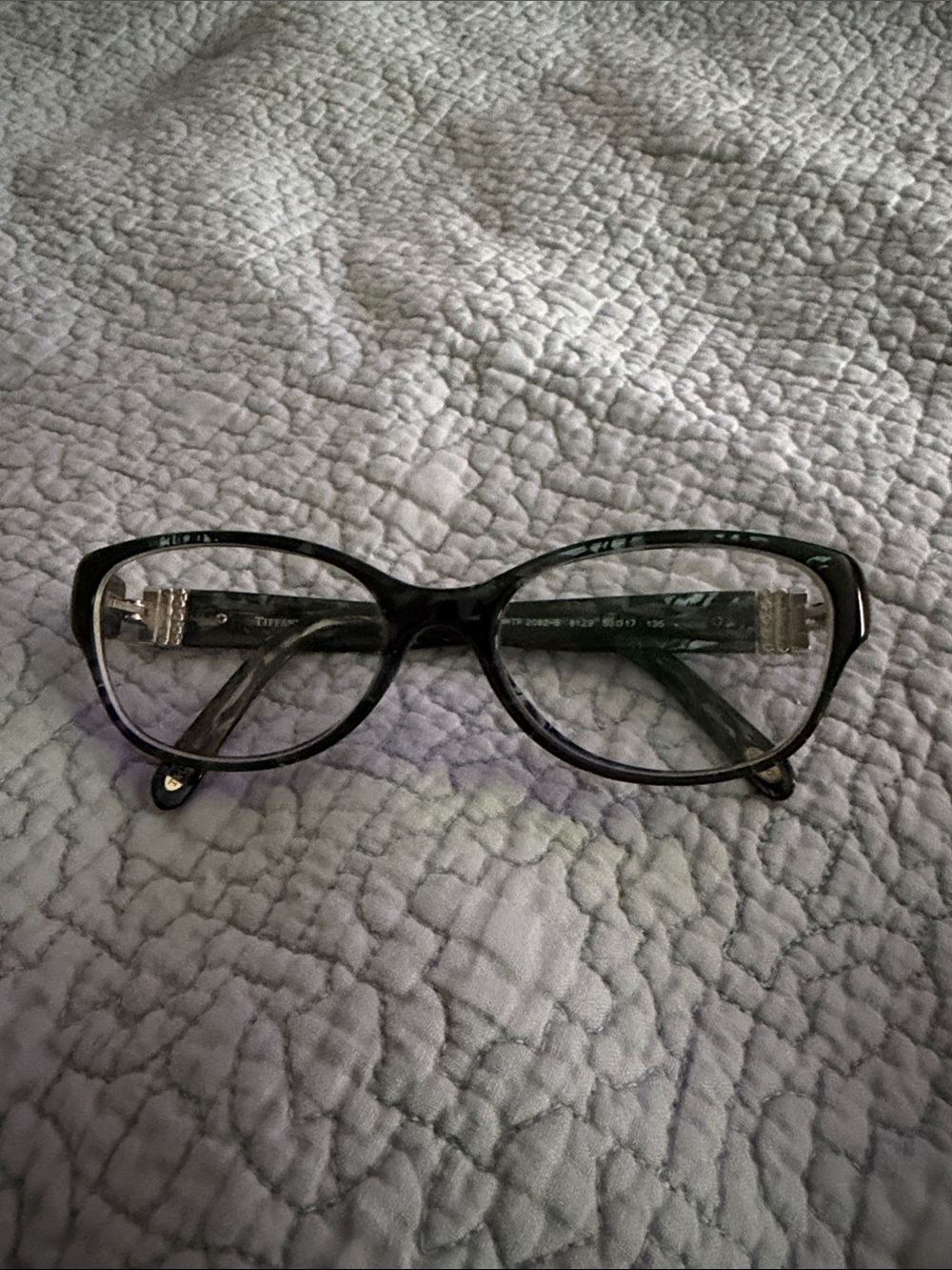 Tiffany Blue and Black Women's Cat-Eye Eyeglass Frames. With other items.